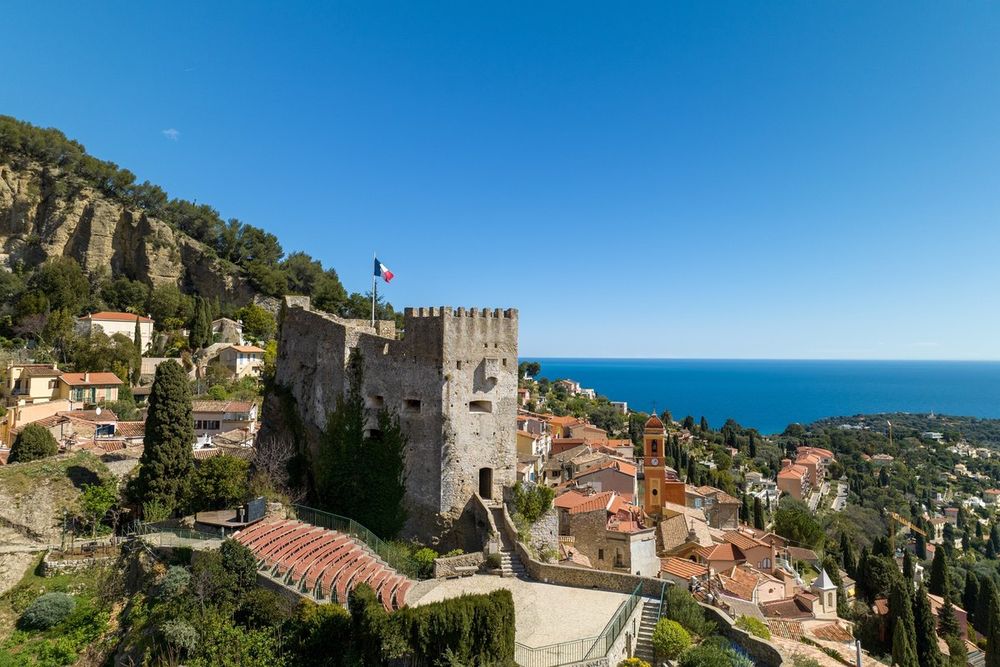 Roquebrune's castle keep and the stepped houses of the medieval village on the hillside above the sea