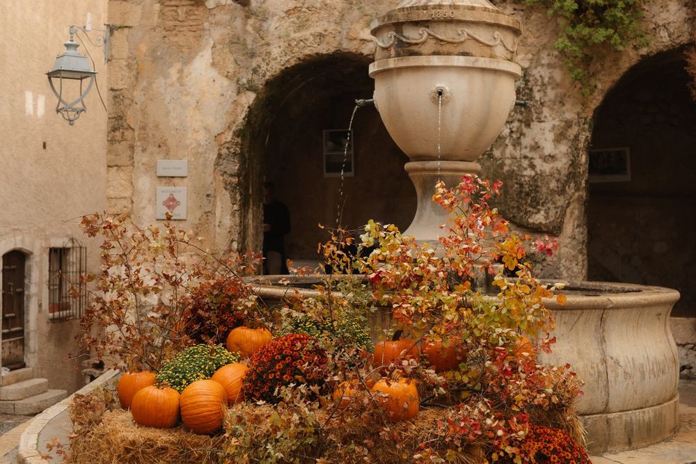 The Grande Fontaine in Saint-Paul de Vence dressed with pumpkins and autumn leaves
